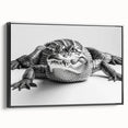 Framed wall art showcasing a vibrant design of reptiles, gators, and crocodiles in a black frame. This colorful canvas adds a unique touch to any room decor.