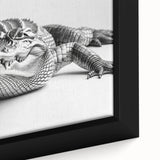 Close-up of a framed canvas wall art depicting a vibrant reptile design featuring alligators and crocodiles, showcasing intricate details and rich colors, perfect for animal lovers' decor.