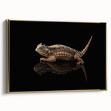 Framed wall art featuring a vibrant lizard design in gold tones, showcasing intricate details and textures, perfect for reptile enthusiasts and home decor lovers.