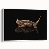 Framed wall art showcasing a vibrant reptile lizard design on canvas, highlighting intricate patterns and colors, perfect for enhancing modern home decor.
