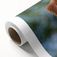 Rolled canvas showcasing vibrant African tribal wall art, featuring intricate patterns and colors, securely packaged in a durable cardboard tube for safe transport.