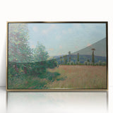 Large art print of an Alfred Sisley landscape in muted greens and blues, framed in gold acrylic.