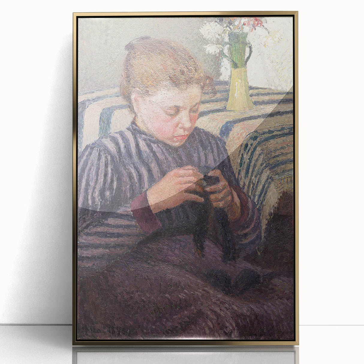 Large art print of a Camille Pissarro painting in gold frame, featuring a rural landscape in muted greens and blues.