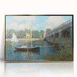 Large art print of Claude Monet's impressionist painting, with vibrant green and blue tones, framed in gold acrylic.