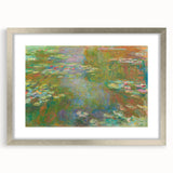 Textured art print of an abstract Claude Monet design in muted blues and greens, framed in silver.