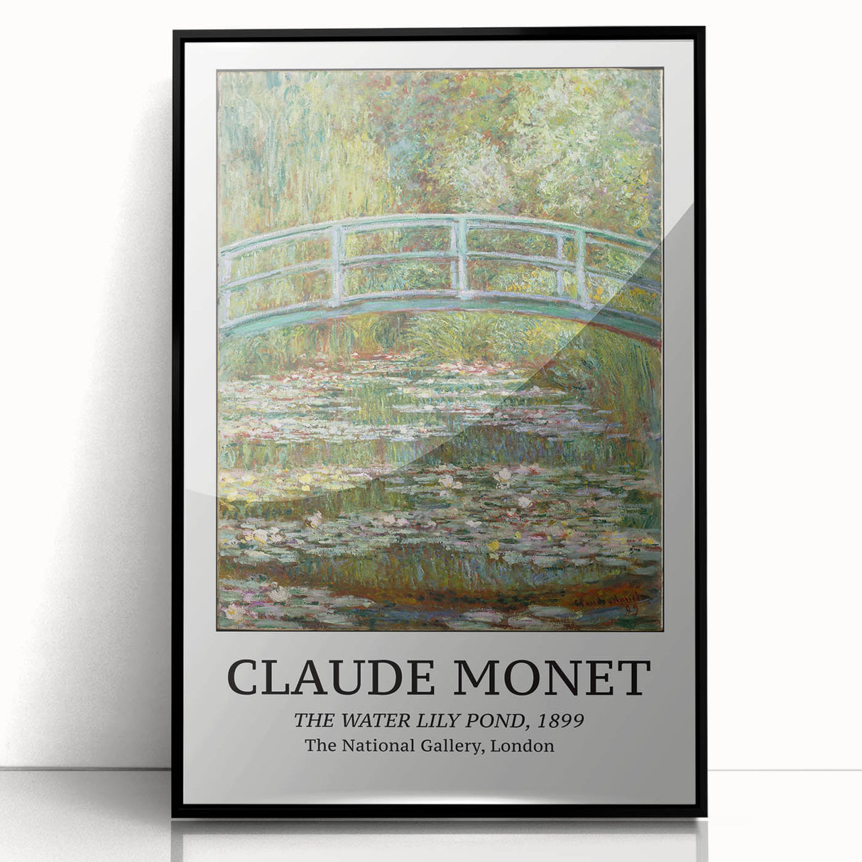 Framed acrylic print of a large abstract wall art by Claude Monet, featuring muted blues and greens.