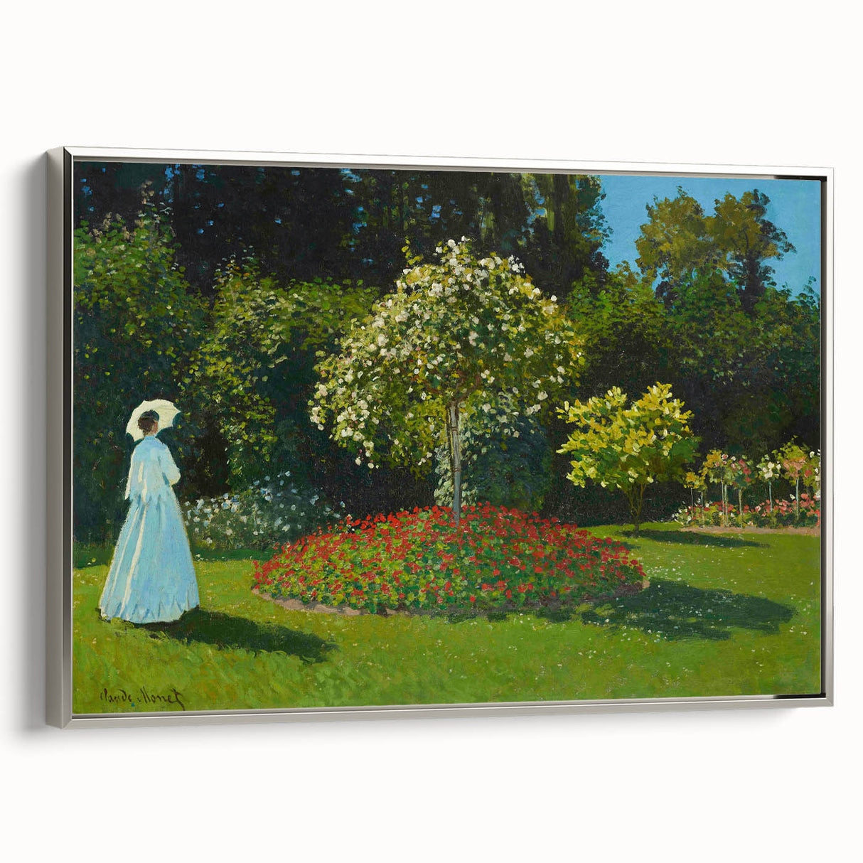 Framed canvas featuring a Claude Monet landscape painting with vibrant colorful art on a black background.