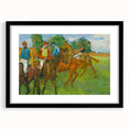 Colorful abstract art print of dynamic shapes in a black frame, ideal for living room ambiance.