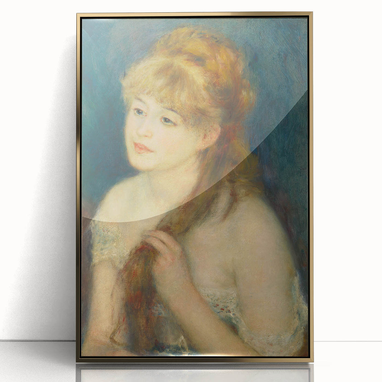 Large art print of a Pierre-Auguste Renoir painting in a gold frame, featuring soft pastel shades.