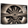 Side view of an airplane depicted in large abstract style on acrylic glass, in shades of gray and blue.