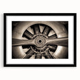 Abstract art print featuring a colorful, textured airplane design on an extra-large black-framed canvas.