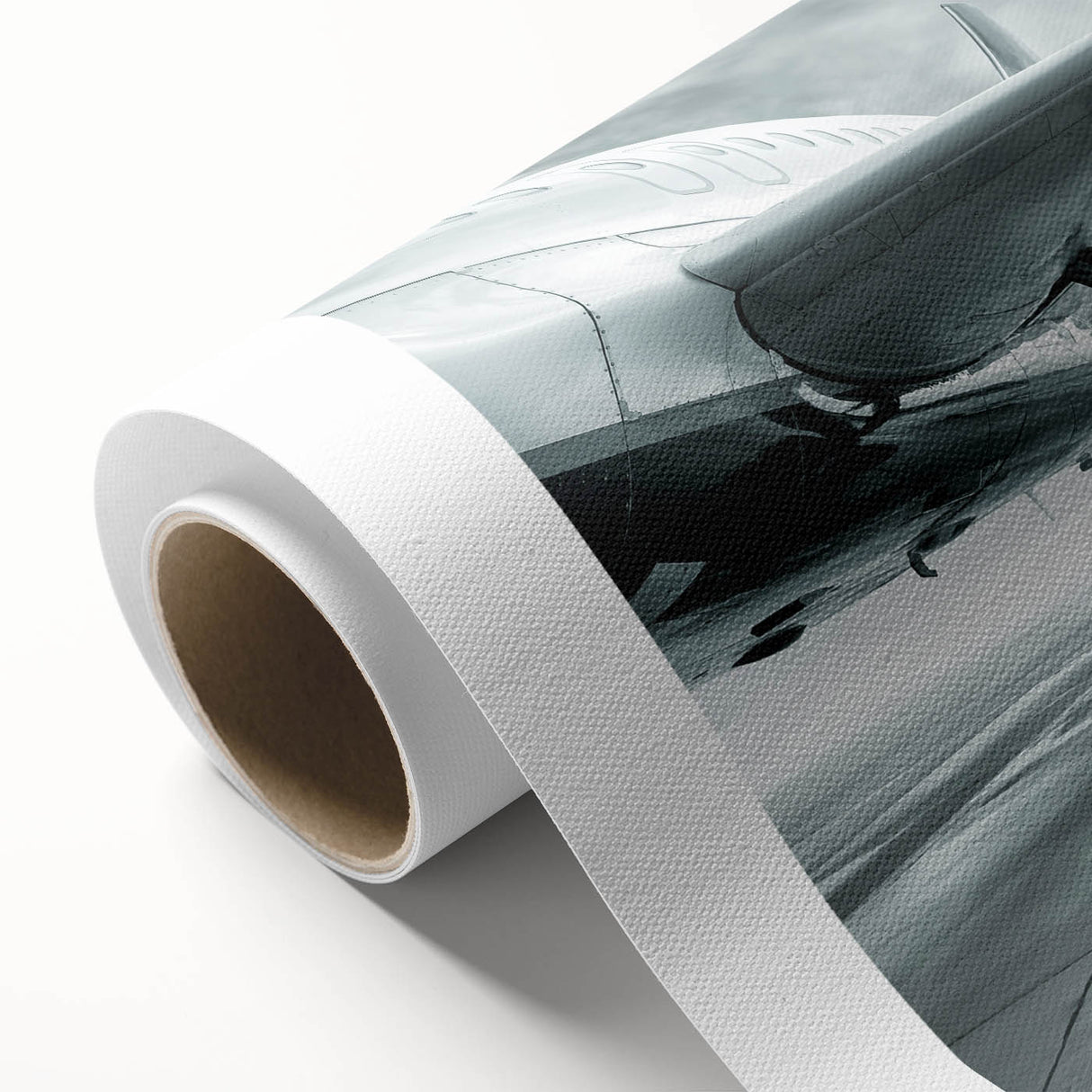 Art deco style airplane illustration on rolled canvas, with muted blue and gray tones, ideal for nursery wall art.