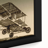 Extra large black wall art featuring a textured, colorful airplane design on a framed canvas, ideal for living room decor.
