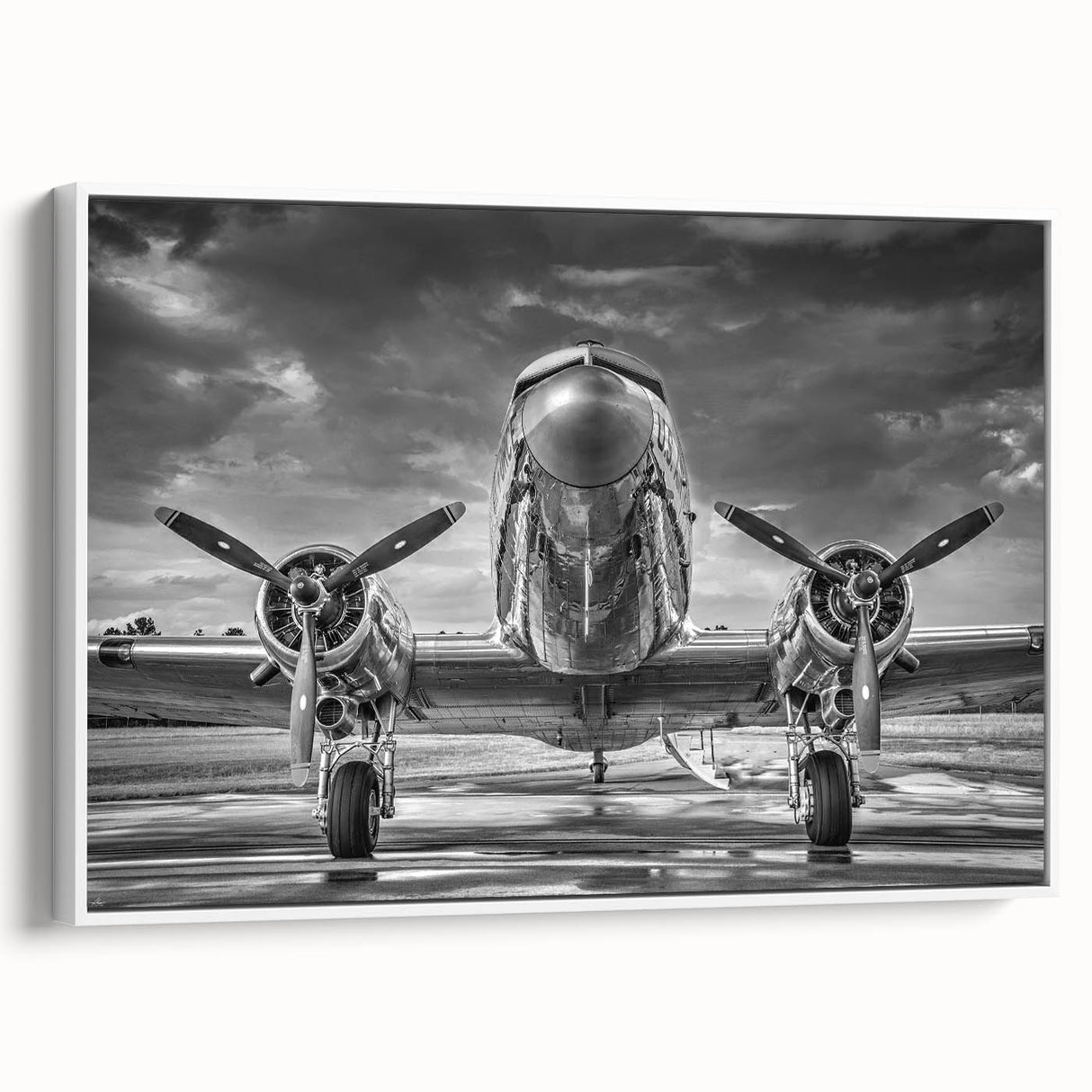 Framed canvas depicting a vintage airplane, rendered in black with colorful accents, ideal for a study or office wall.