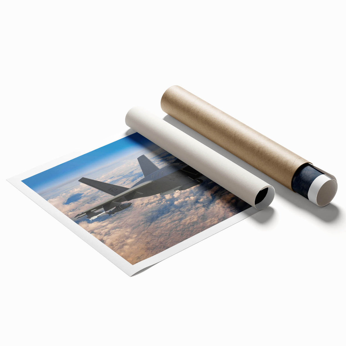 Rolled print of an airplane in flight, depicted in muted gray and blue tones, ideal for modern dining room decor.