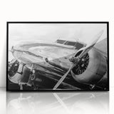 Large abstract wall art featuring airplanes in mid-century modernist style, framed in black acrylic.