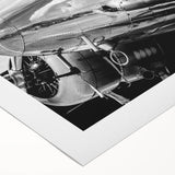 Art deco poster of a vintage airplane in muted sepia tones on rolled canvas, suitable for dining room or bathroom wall art.
