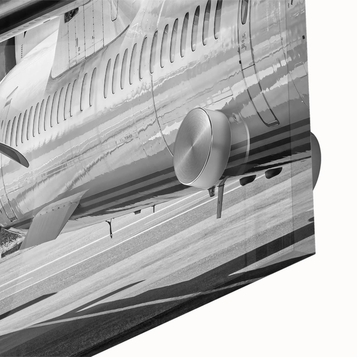 Large abstract wall art featuring an airplane design in neutral tones on acrylic glass.