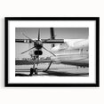 Extra large, colorful abstract art print of an airplane, textured on black framed canvas, ideal for living room decor.