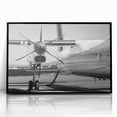 Mid-century modernist large abstract wall art featuring colorful airplanes, acrylic print in black frame.