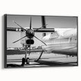 Black and white framed canvas featuring a vintage airplane side view, suitable for bedroom wall decor.