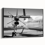 Black and white framed canvas featuring a vintage airplane side view, suitable for bedroom wall decor.