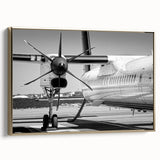 Side view of a vintage airplane in black and gold on a framed canvas, suitable for bedroom wall decor.