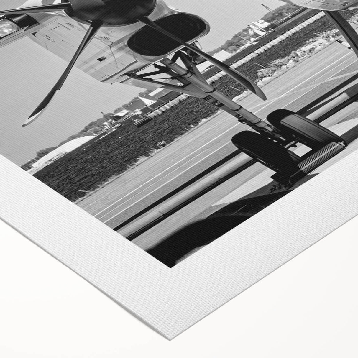 Art deco poster of a vintage airplane in muted gold and navy tones on rolled canvas, suitable for dining room wall art.