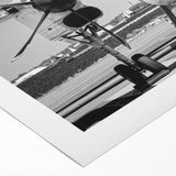 Art deco poster of a vintage airplane in muted gold and navy tones on rolled canvas, suitable for dining room wall art.