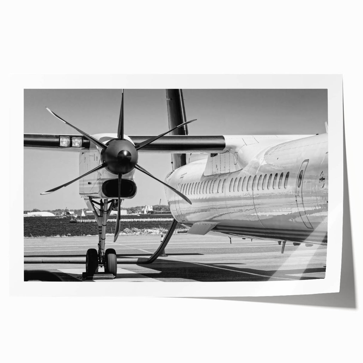 Art deco poster featuring a vintage airplane in muted sepia tones, ideal for dining room wall art.