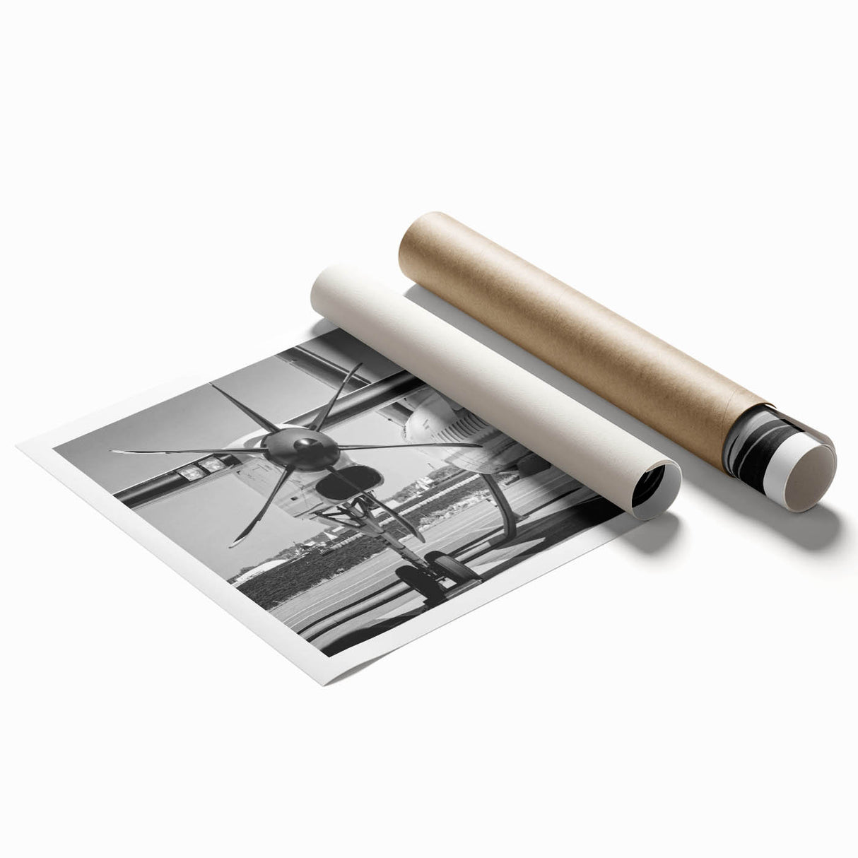 Rolled print of an airplane in flight with a backdrop of clear skies, ideal for art wall dining room.