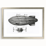 Textured art print of an abstract airship in grayscale tones on a framed silver mat, suitable for bedroom decor.