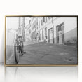 Mid-century modernist art of a bicycle in muted earth tones on a gold-framed acrylic, ideal for nursery wall art.