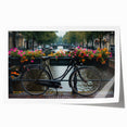 Rolled print of a vintage bicycle and floral design in muted earth tones.