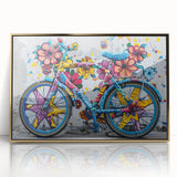 Mid-century modernist bicycle art print in a gold frame, featuring neutral tones, ideal for nursery or living room decor.