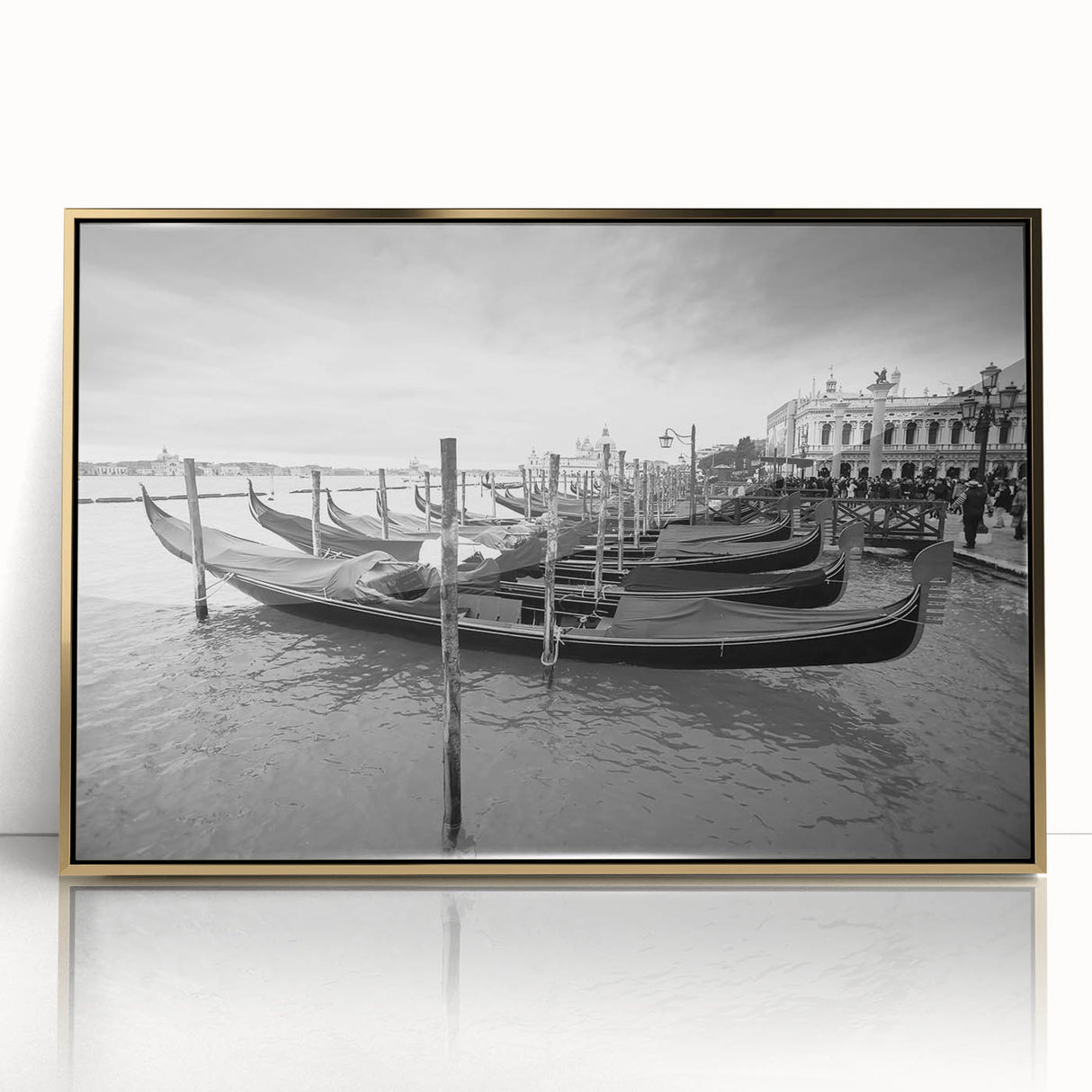 Mid-century modernist art deco poster featuring a gondola on water, in muted gold and blue tones, framed acrylic.