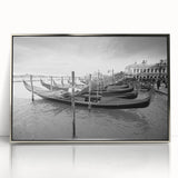 Art deco poster of a silver-framed acrylic print featuring a gondola on water, in muted blues and grays.
