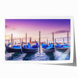 Venetian gondola on a serene canal, in a rolled print with muted blue and gray tones, suitable for dining room wall art.