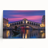Black and white photo of a gondola on a calm waterway, printed on large stretched canvas.