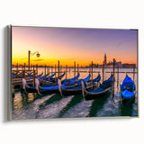 Vintage poster art of a gondola on water, featuring a black and colorful palette on a framed canvas.