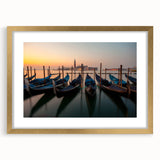 Textured art print of an abstract gondola in muted gold and black tones on a framed canvas, suitable for bedroom decor.