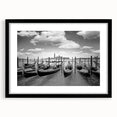 Colorful abstract art print of a gondola on textured canvas, framed in black, suitable for large living room walls.