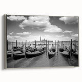 Vintage poster art of a gondola on water, rendered in black with colorful accents, framed canvas.