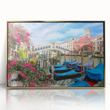 Mid-century modernist art depicting a gondola on water in muted gold and black tones, acrylic print framed in gold.