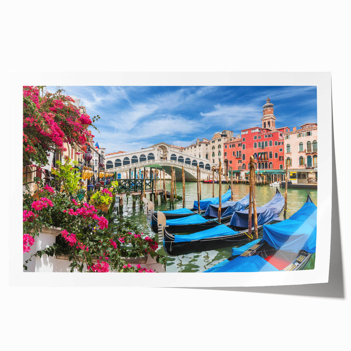 Gondola on a calm canal, depicted in soft blue and gray tones on a rolled print.