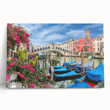Black and white photo of a gondola on calm waters, printed on large stretched canvas.