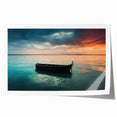 Rolled print of a rowboat on calm waters, in muted blue and gray tones, ideal for dining room wall art.