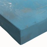 Black and white photo of a rowboat on a calm lake on stretched canvas, ideal for bedroom wall art.