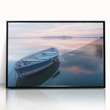 Large abstract wall art featuring a rowboat in muted gray and blue tones, acrylic print in black frame.