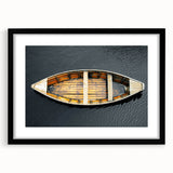 Abstract art print of a colorful rowboat, textured with vibrant hues on a large canvas, ideal for living room decor.